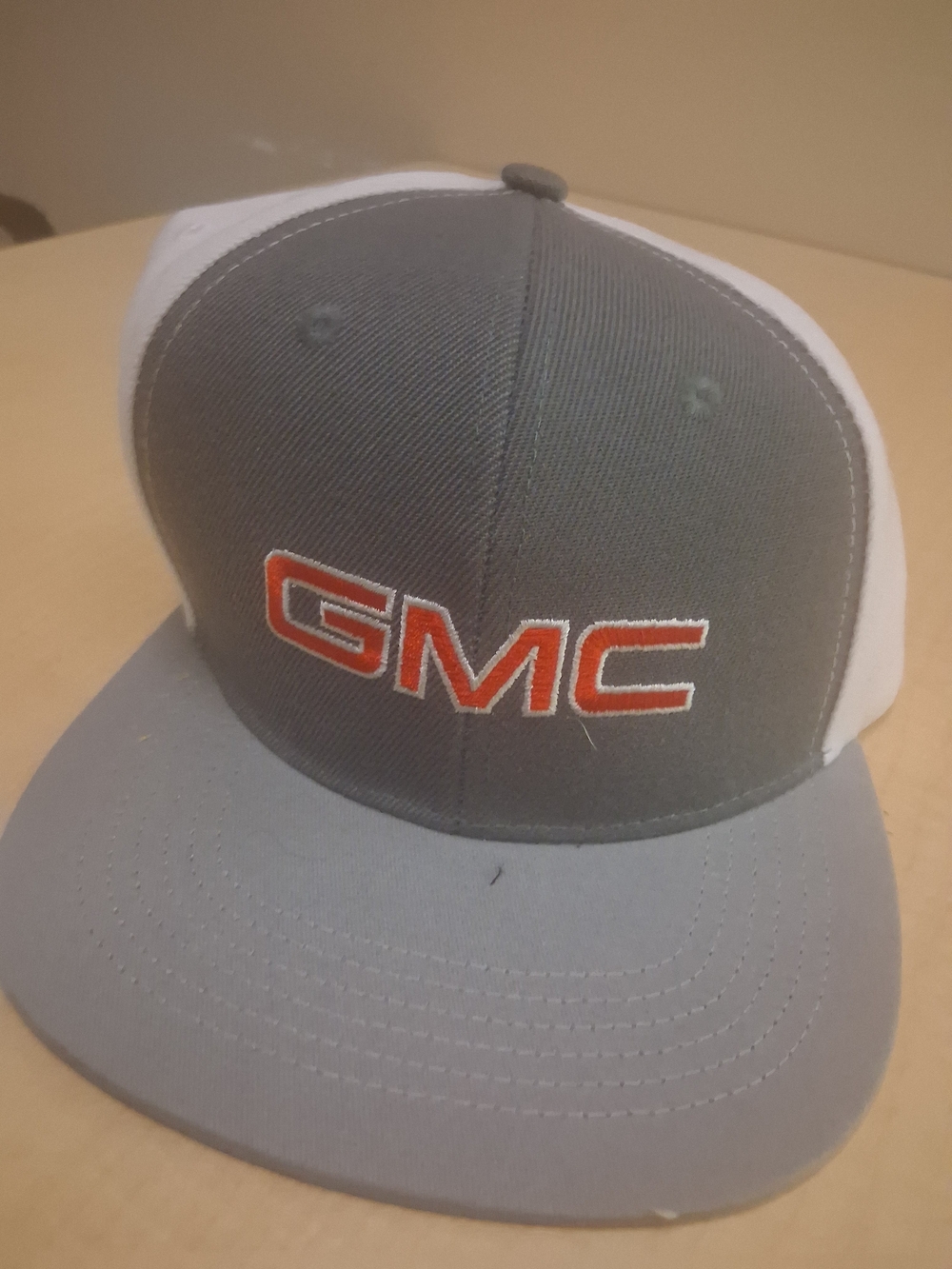 GMC Men's Gray and White Mesh Trucker Hat with Red Logo